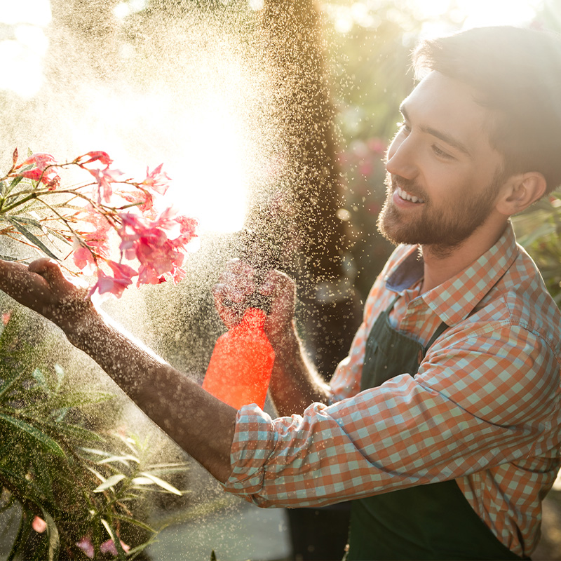 man watering